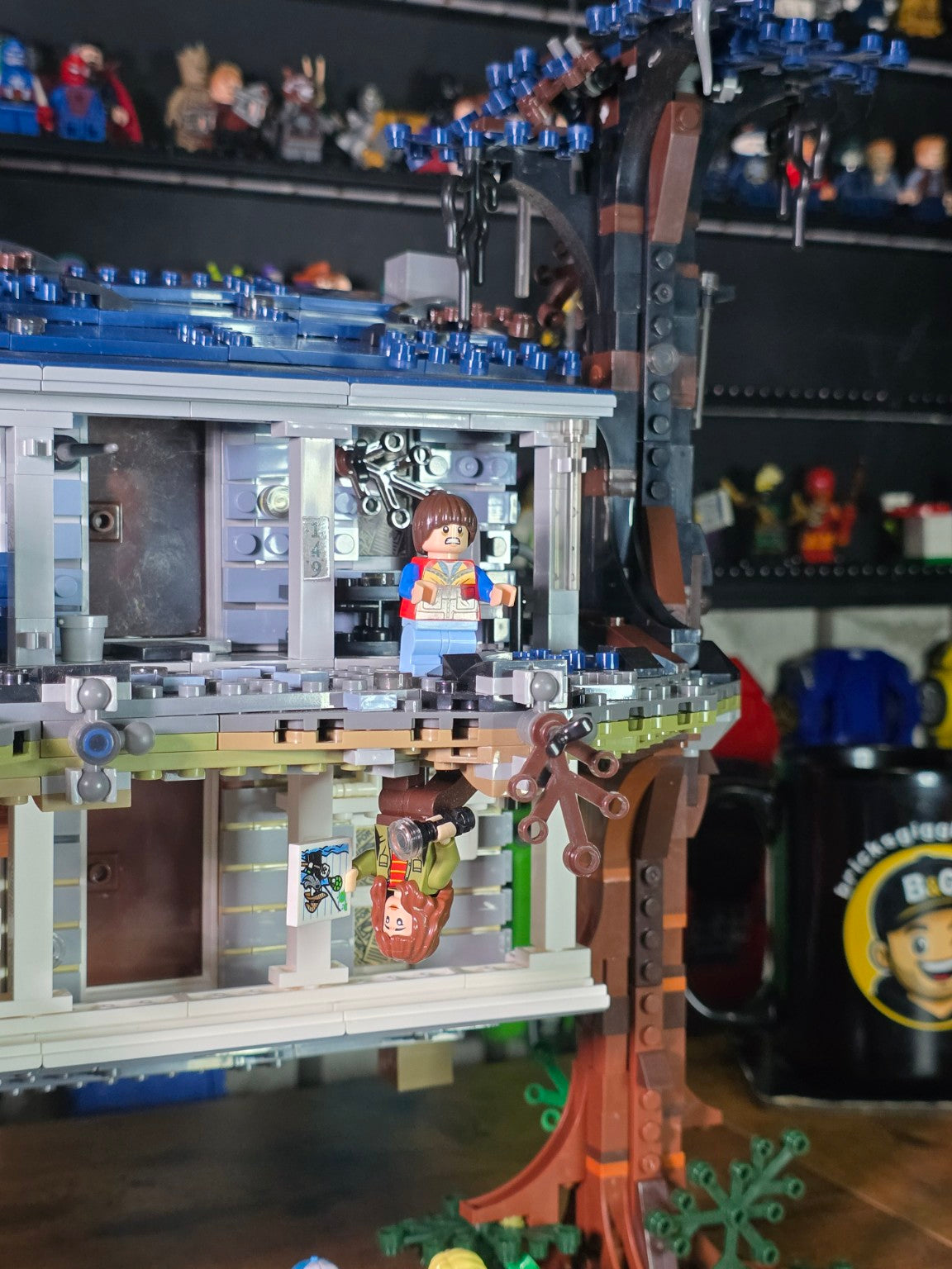 Close-up of character and inverted house details on the Stranger Things Upside Down build