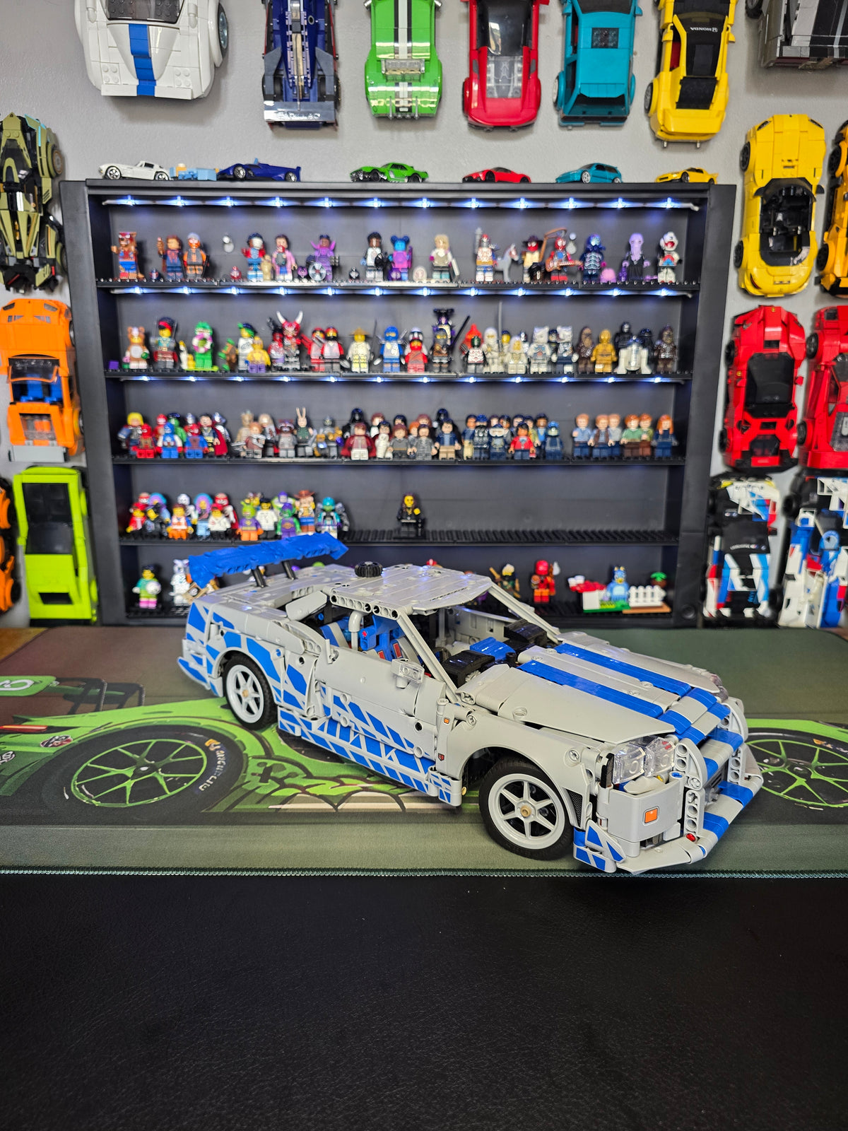 Side profile showing blue racing graphics