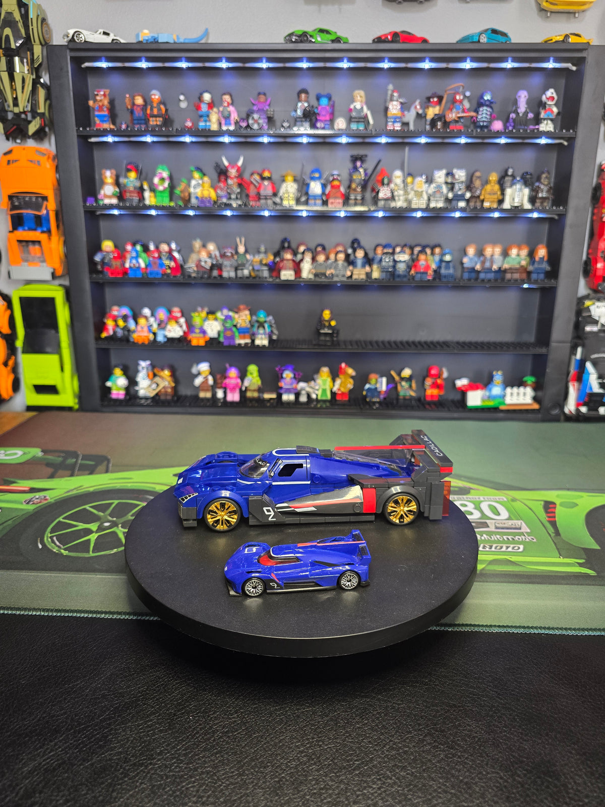 Side view of the blue Cadillac Project GTP and die-cast car