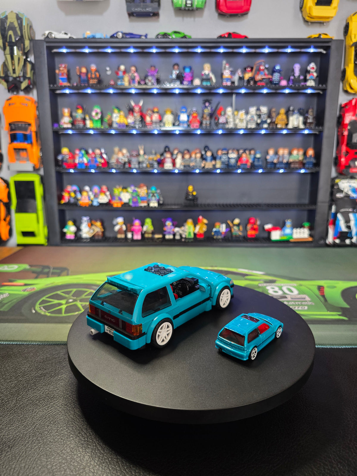 Side view of the large and small Honda Civic EF models