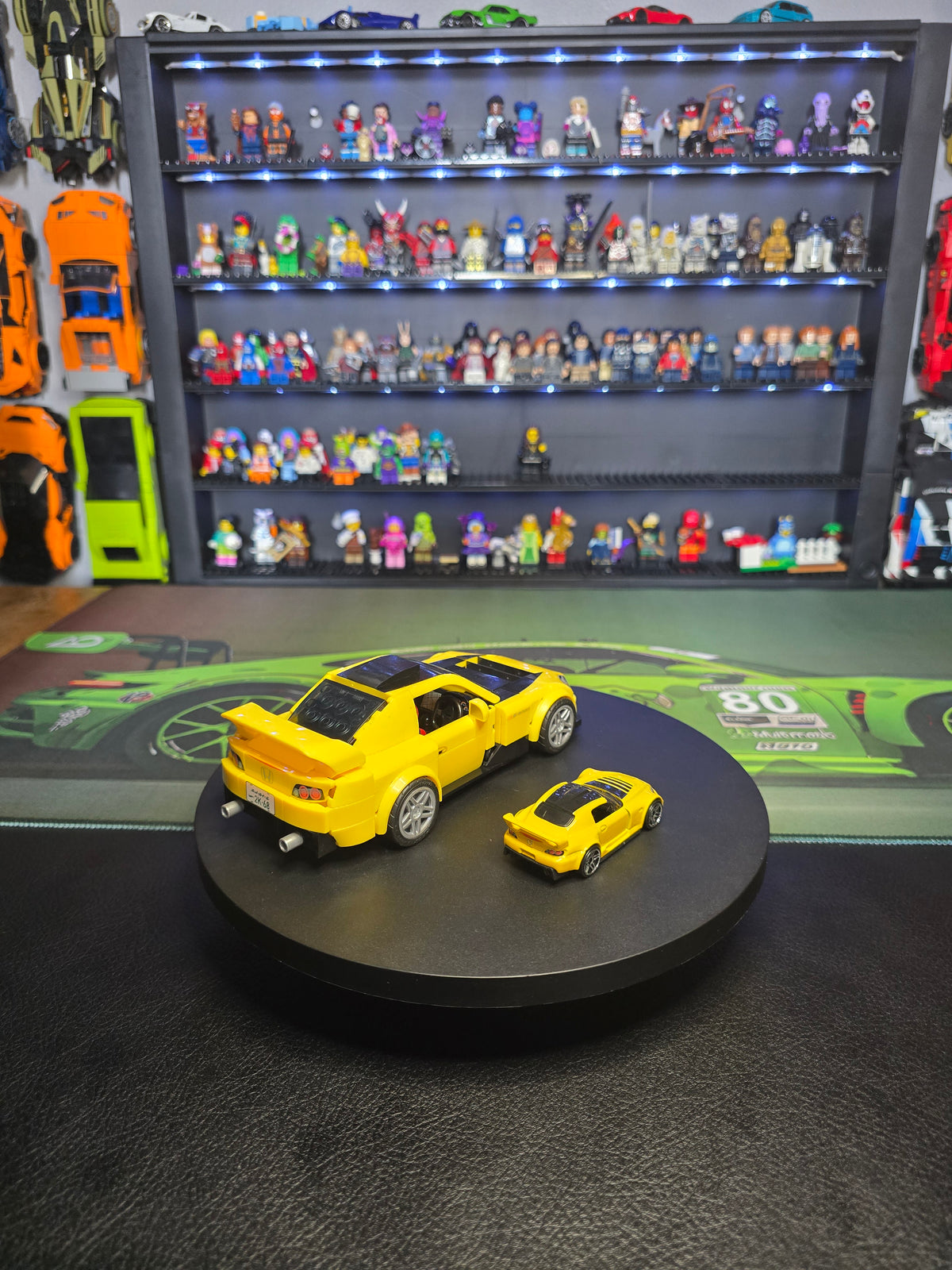 Side view of the yellow Honda S2000 and die-cast car