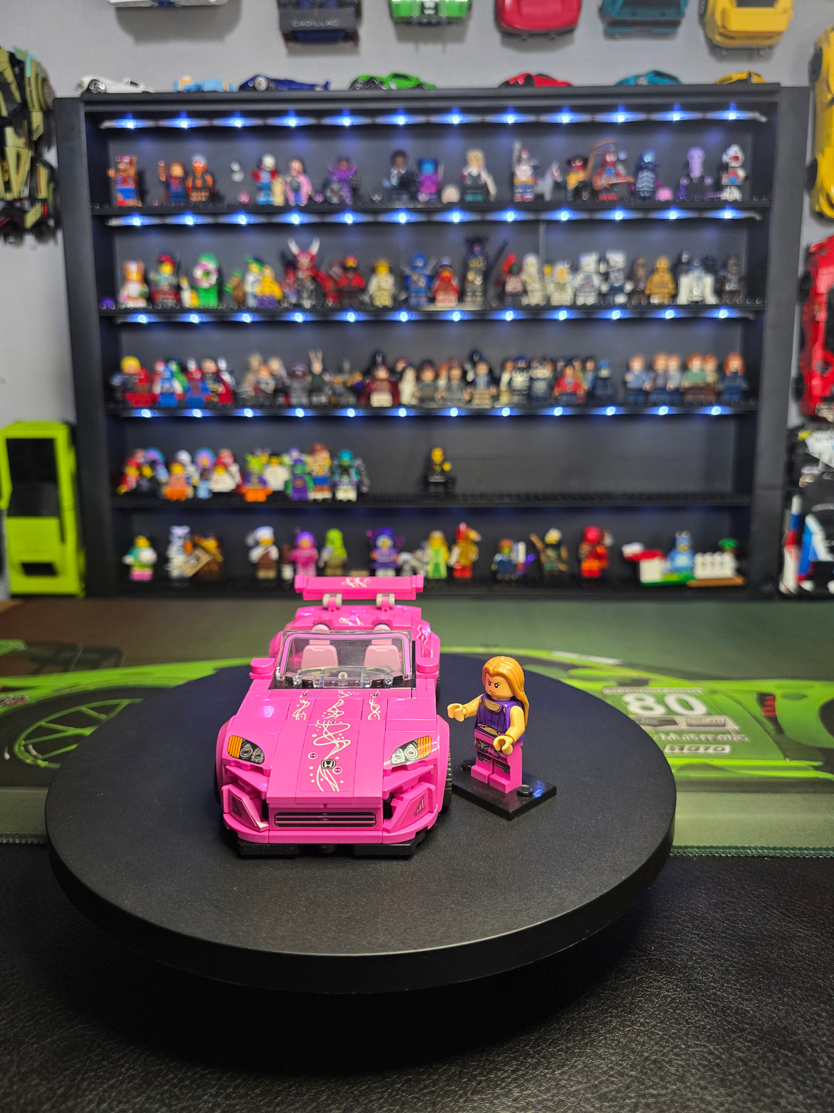 Front view of the pink LEGO Honda S2000 with figure