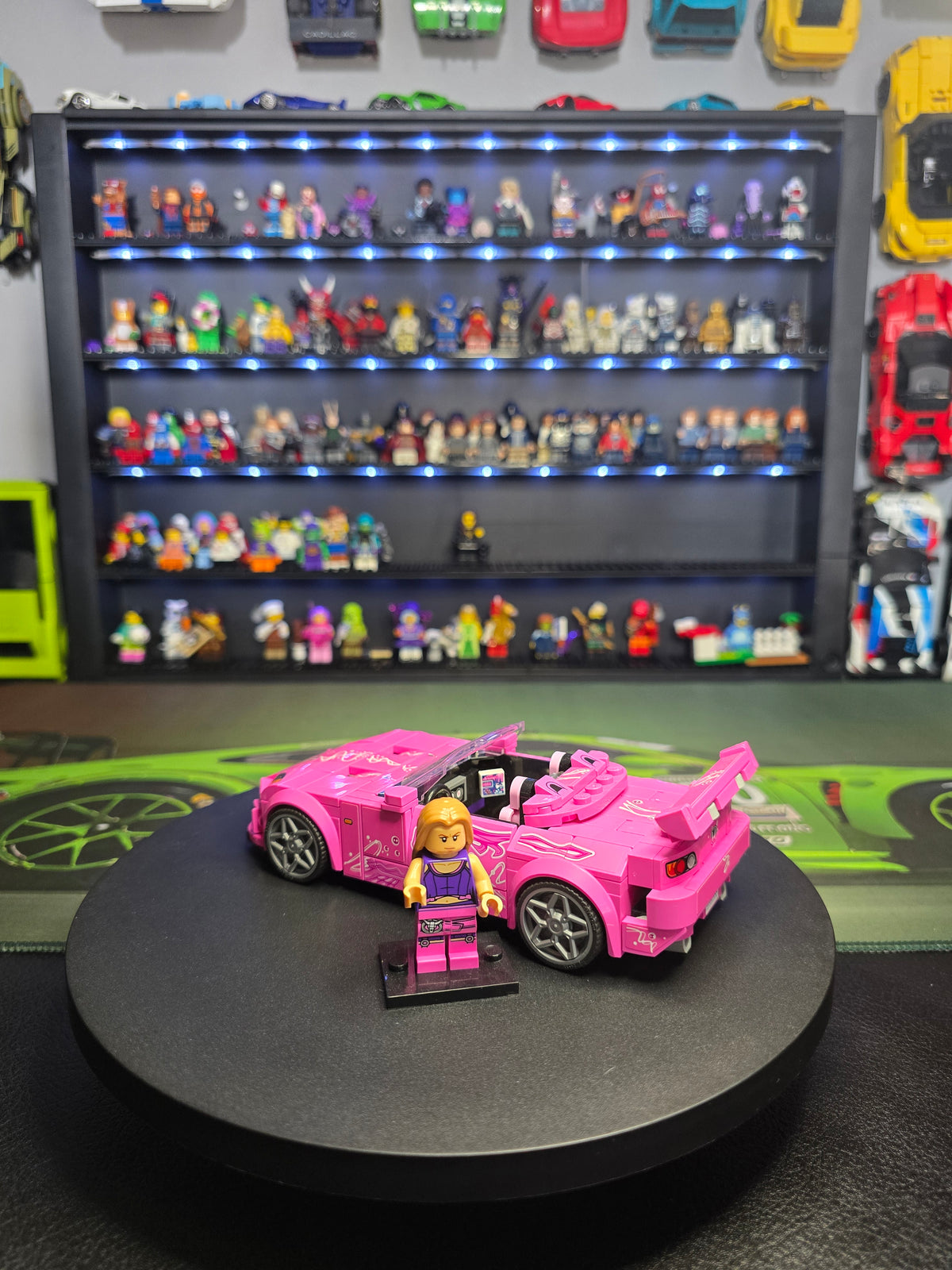 Side view of the pink Honda S2000 and figure