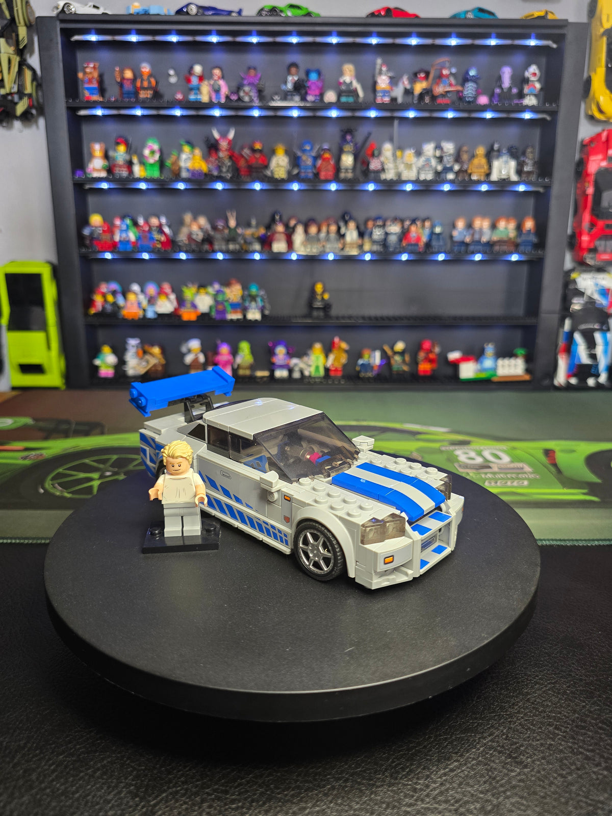 Front three-quarter view of the LEGO Nissan Skyline with figure