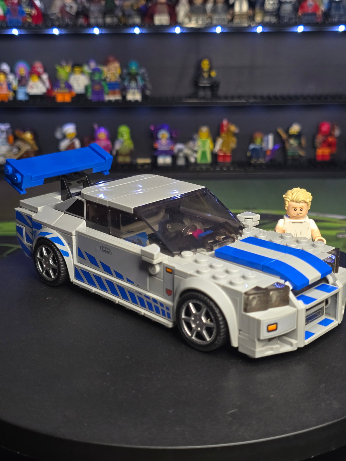 Close view of the silver Skyline and blue racing stripes
