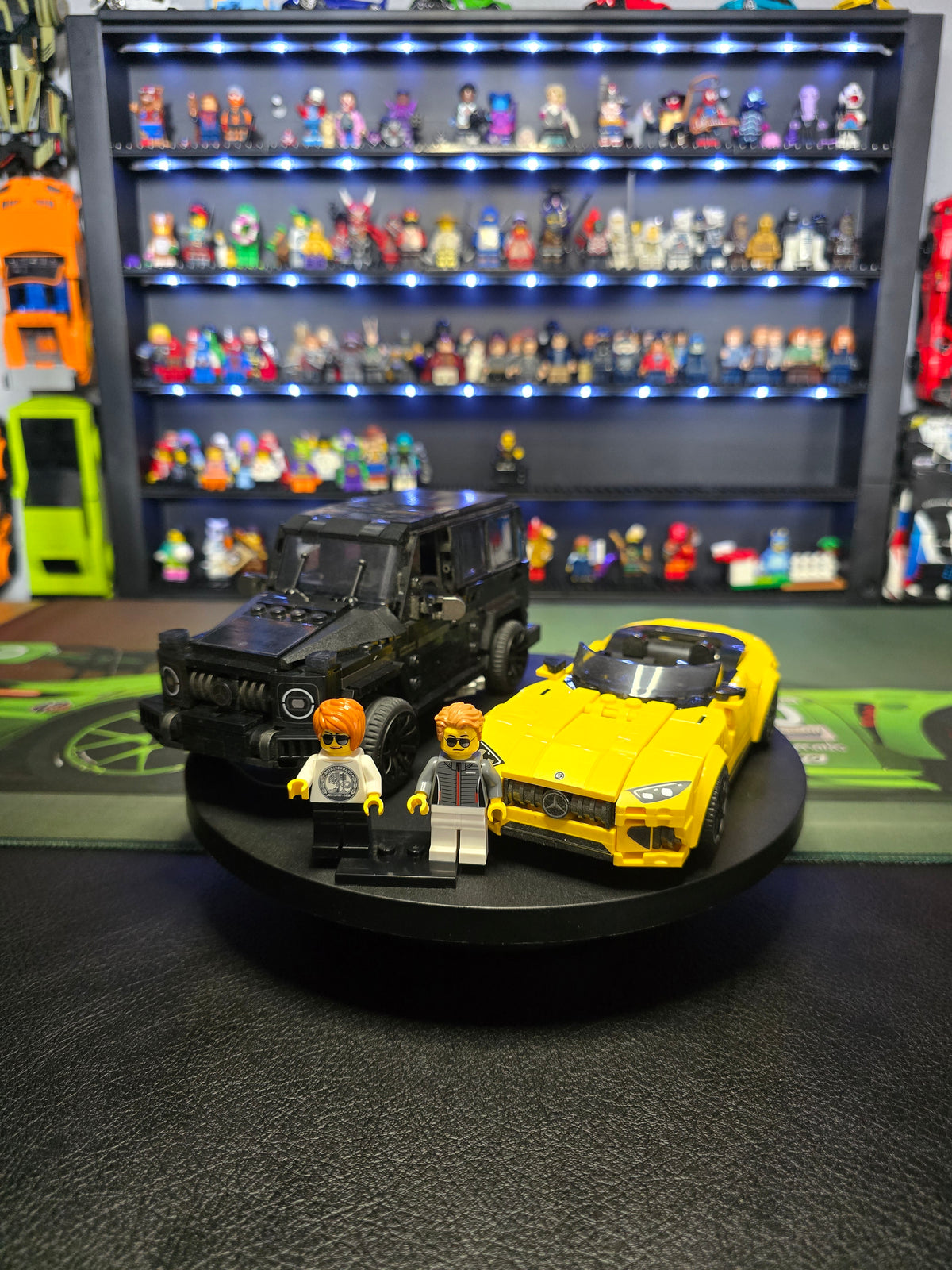 Both Mercedes-AMG models displayed with their driver figures