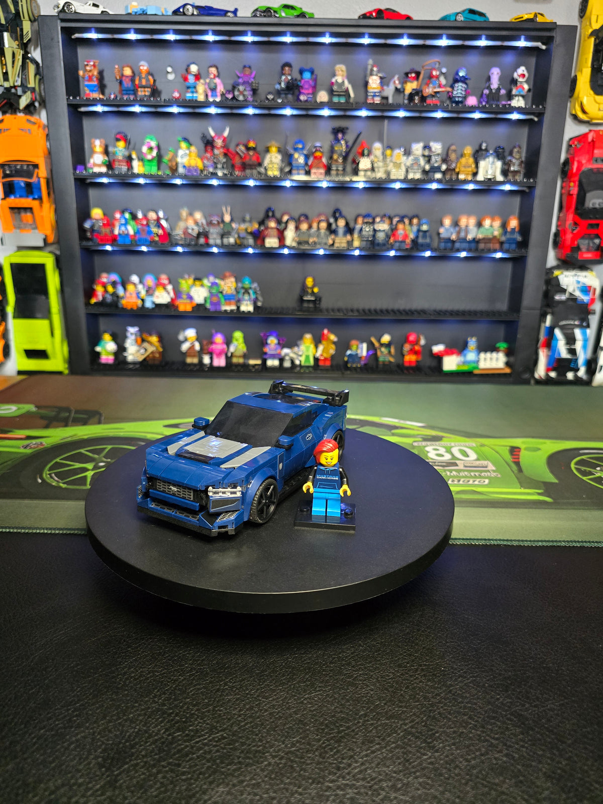 Ford Mustang Dark Horse displayed with its driver figure