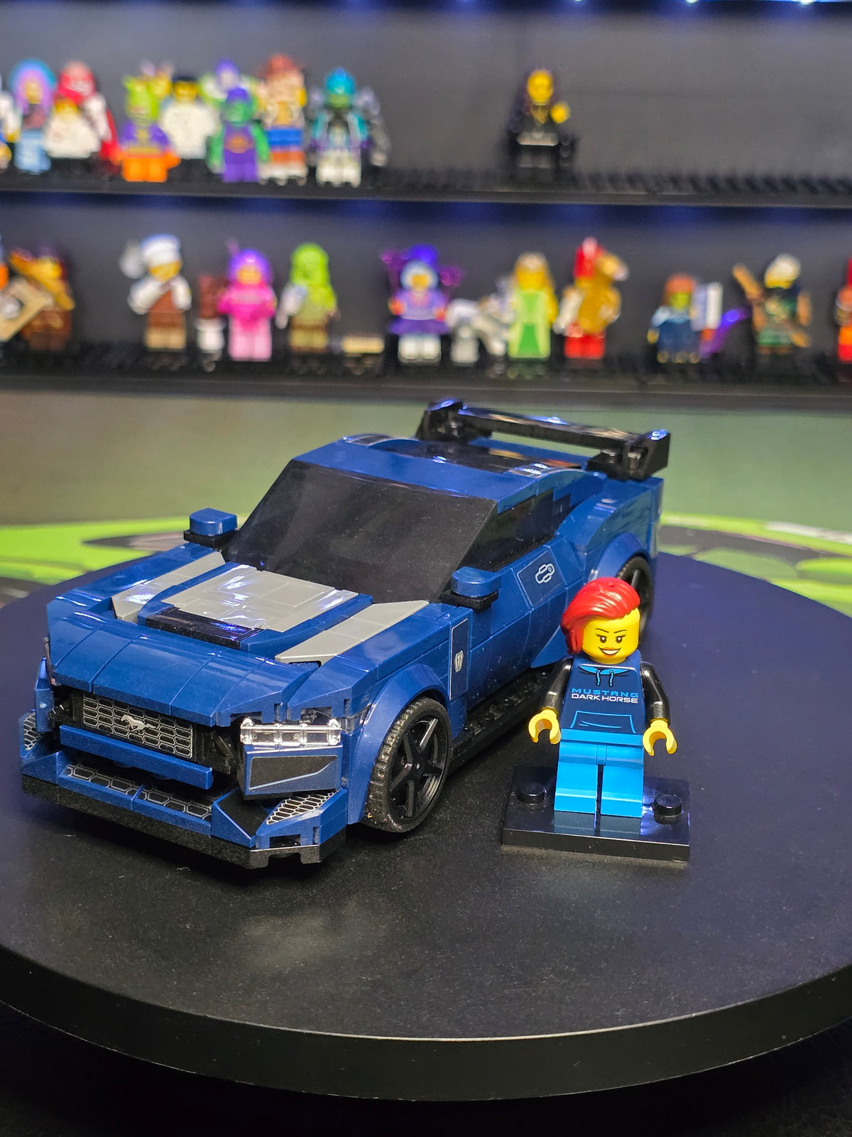 Front three-quarter view of the LEGO Mustang with figure