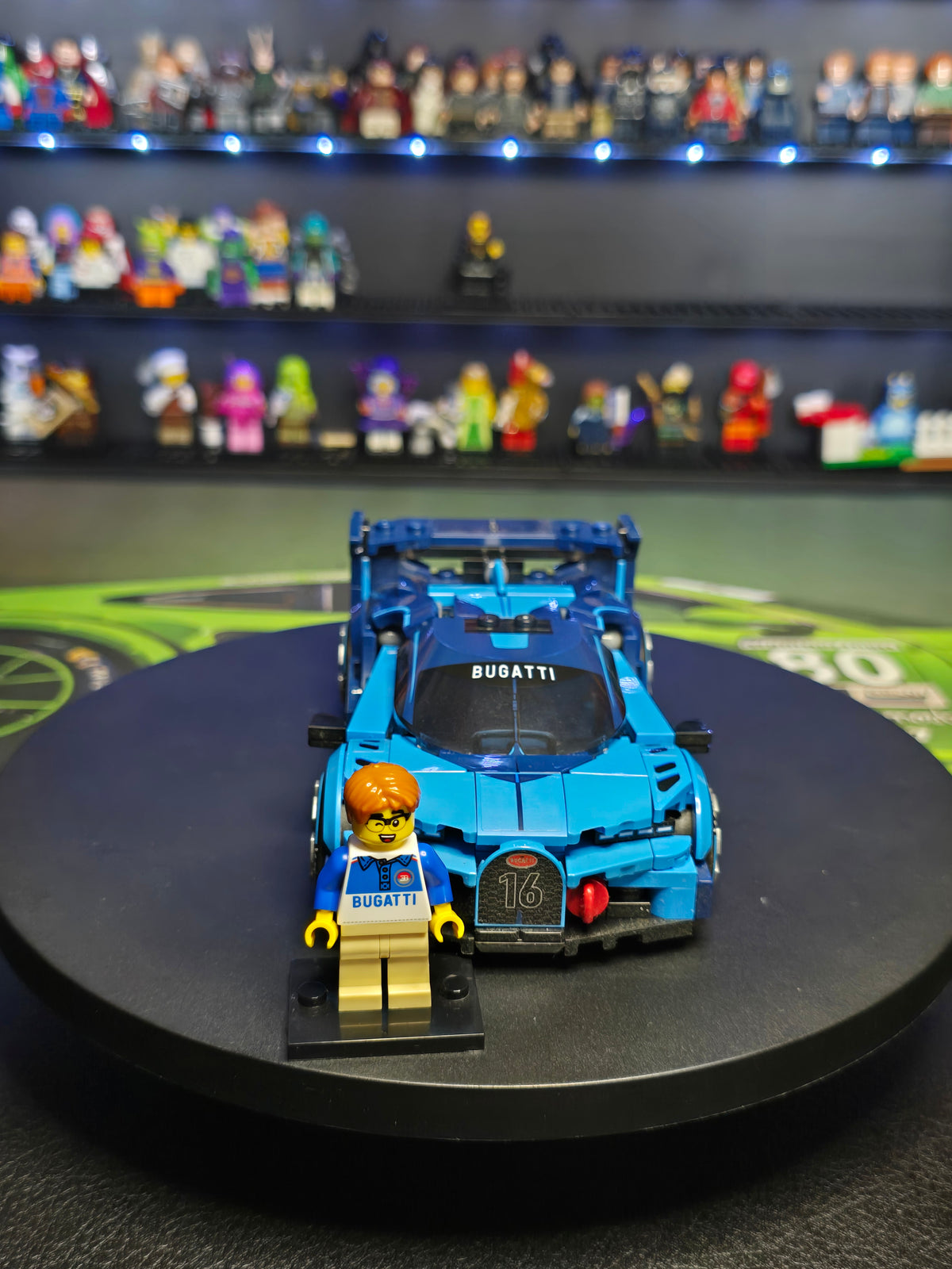 Front view of the blue LEGO Bugatti Vision GT with figure