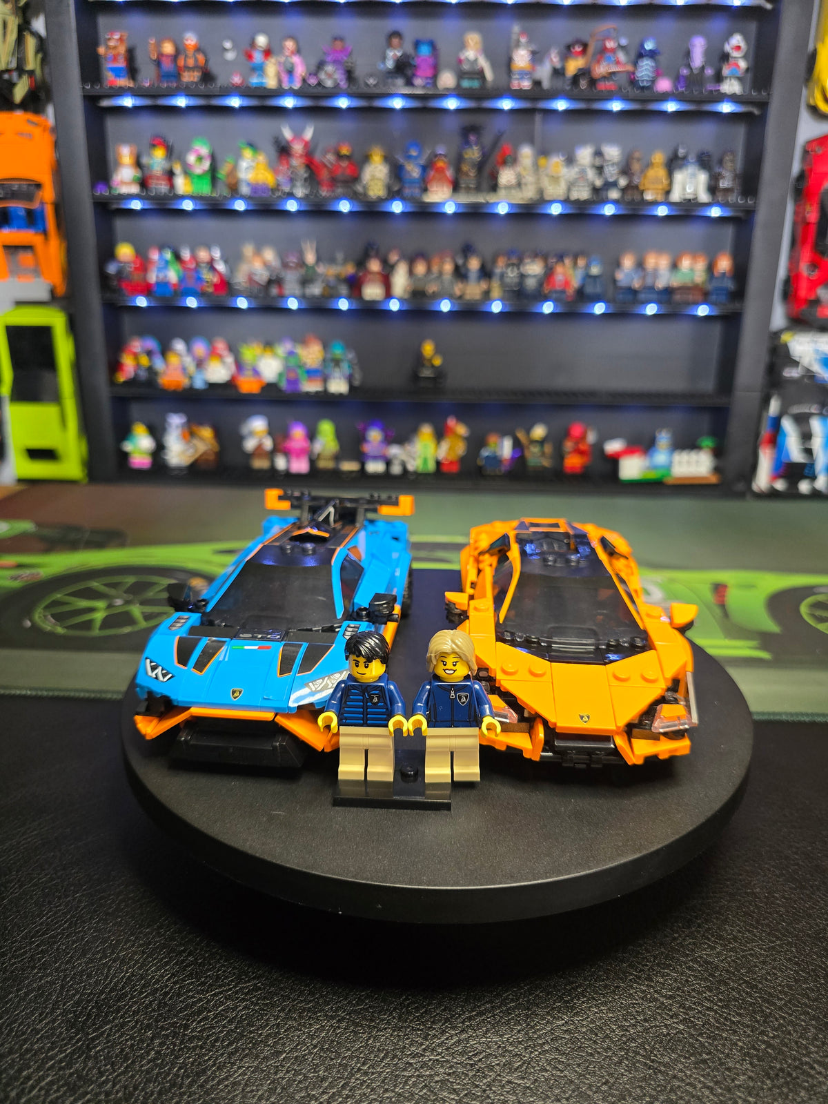Both LEGO Lamborghini models displayed with their driver figures