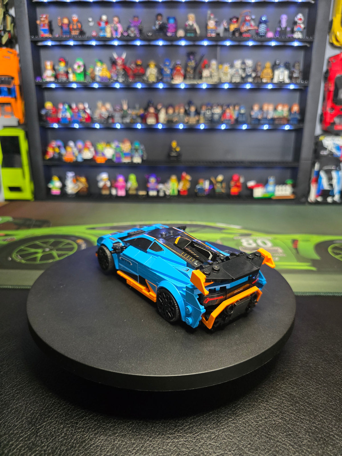 Rear three-quarter view of the blue Huracán STO