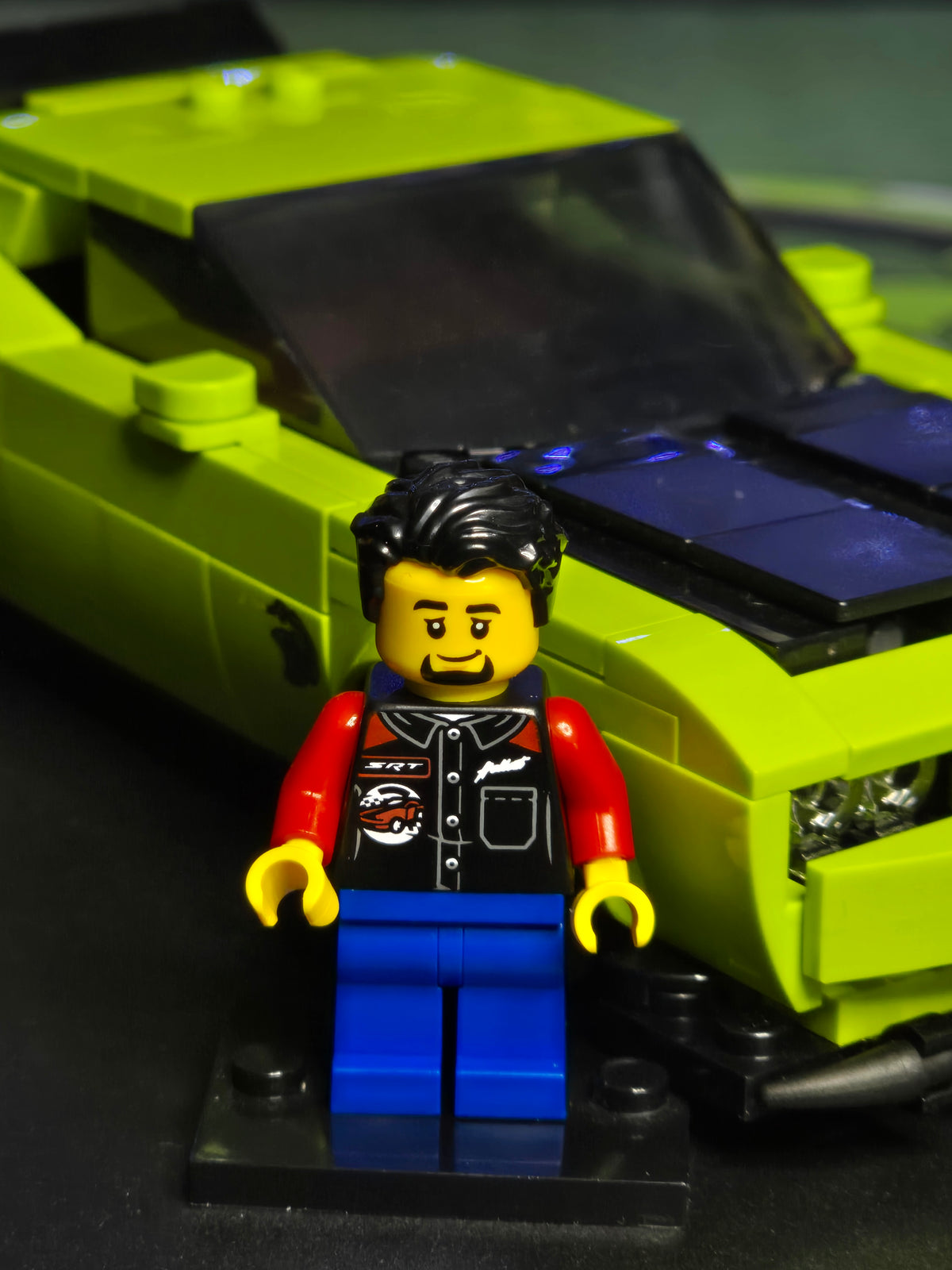 Close-up of the lime Dodge Challenger and driver figure