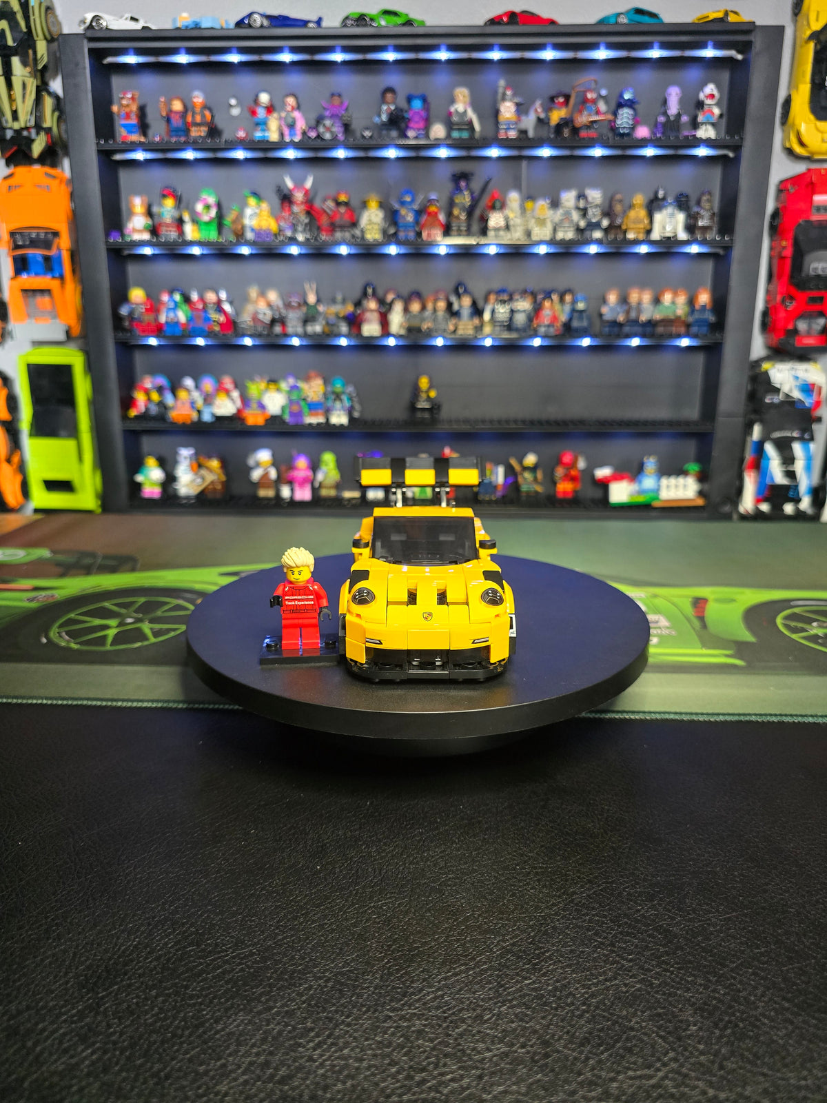 Front view of the yellow LEGO Porsche 911 with figure