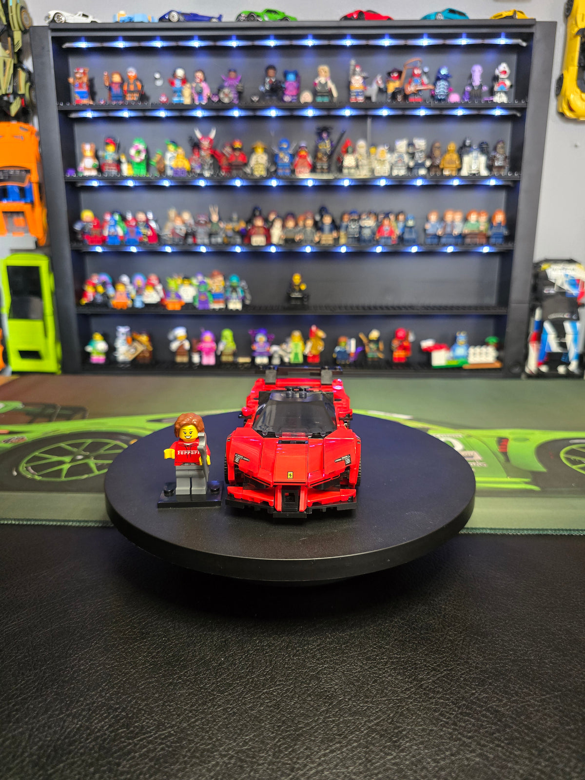 Front view of the red LEGO Ferrari SF90 with figure