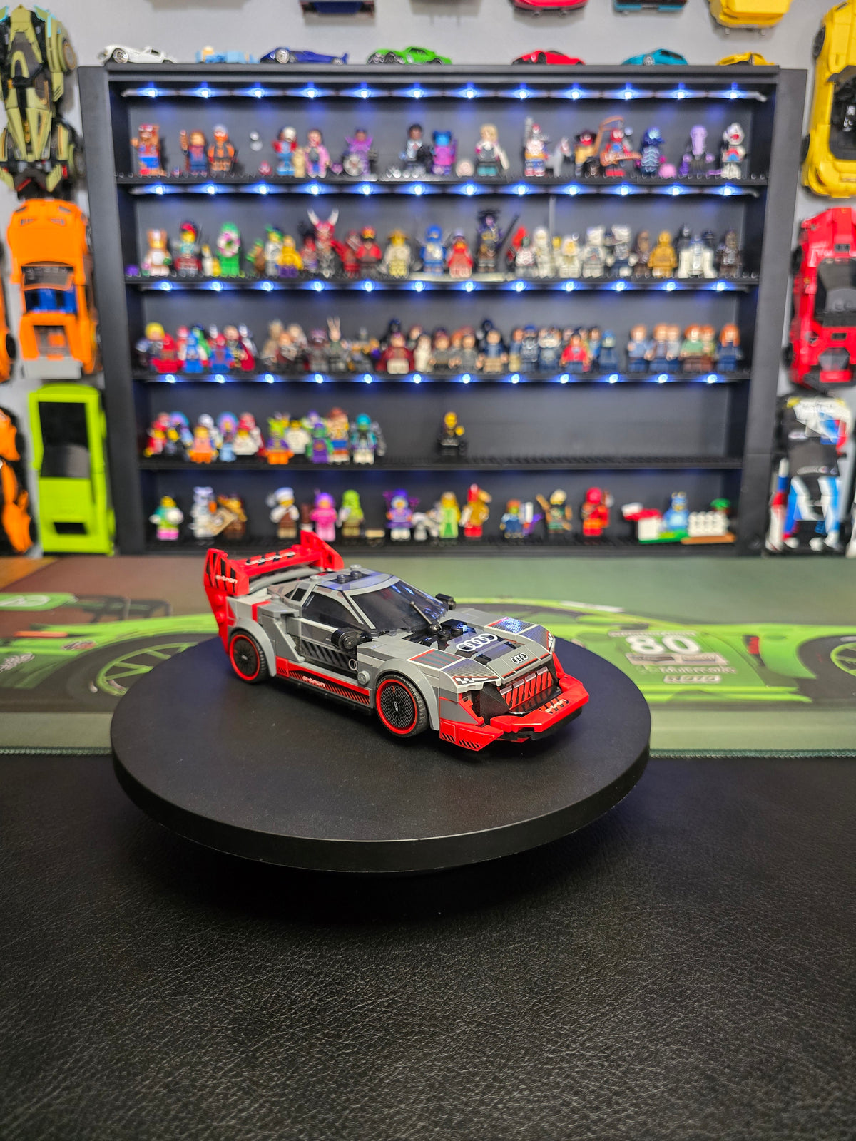 Front three-quarter view of the red and grey LEGO Audi