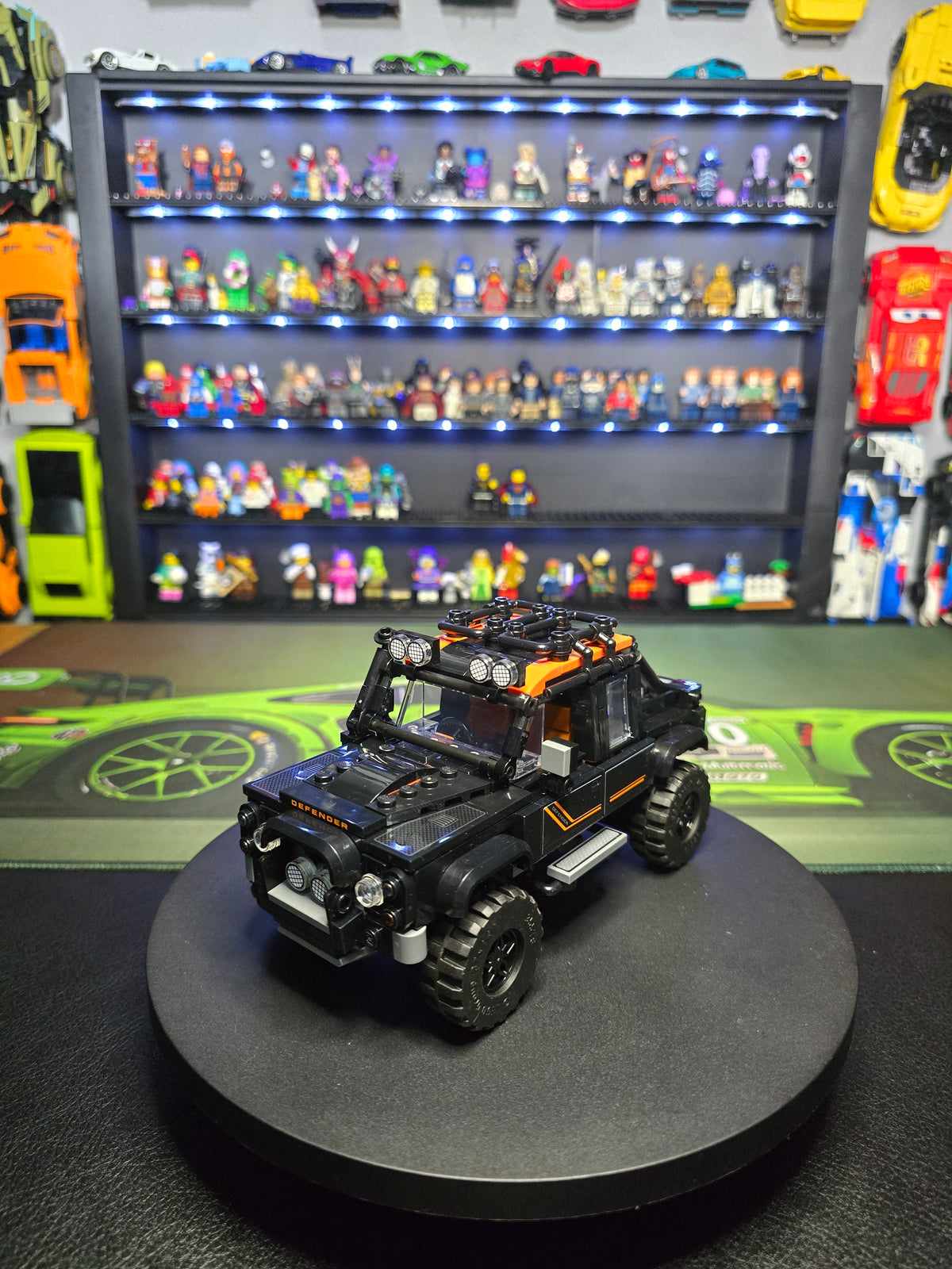 Front three-quarter view of the black LEGO Land Rover Defender