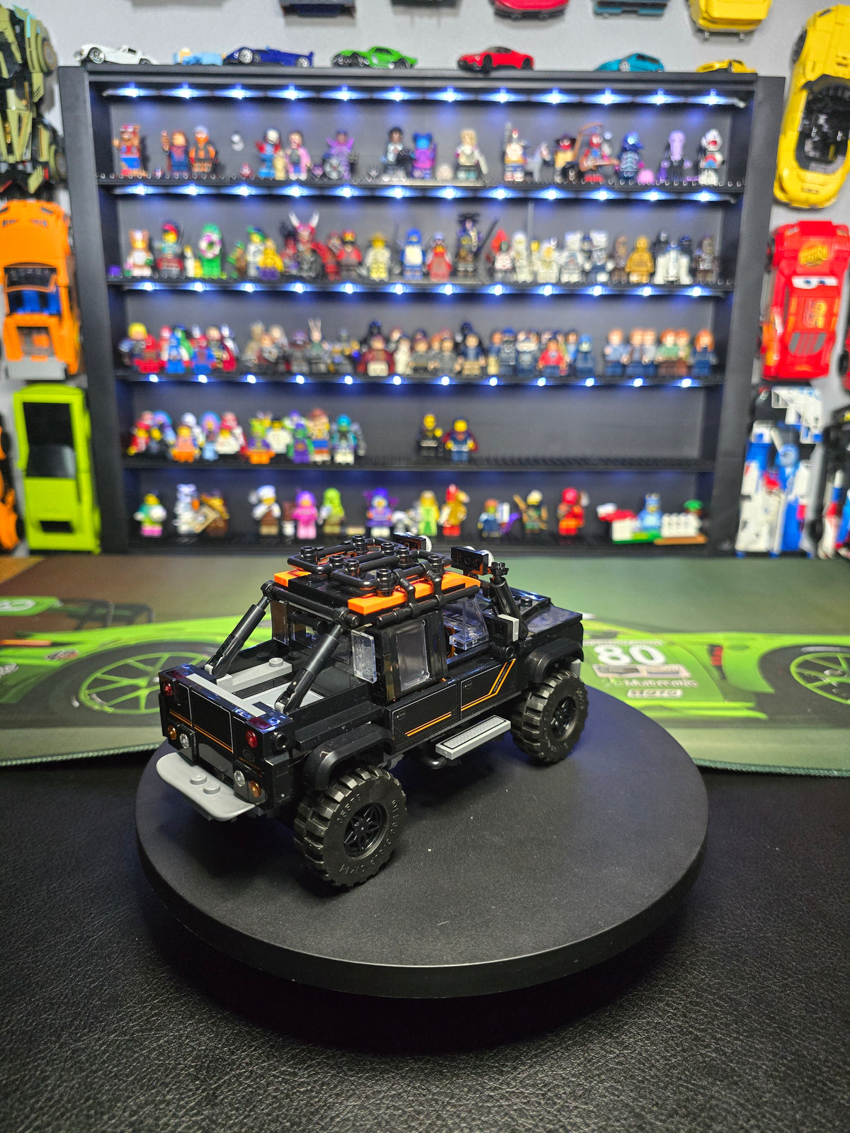 Rear three-quarter view of the black Defender