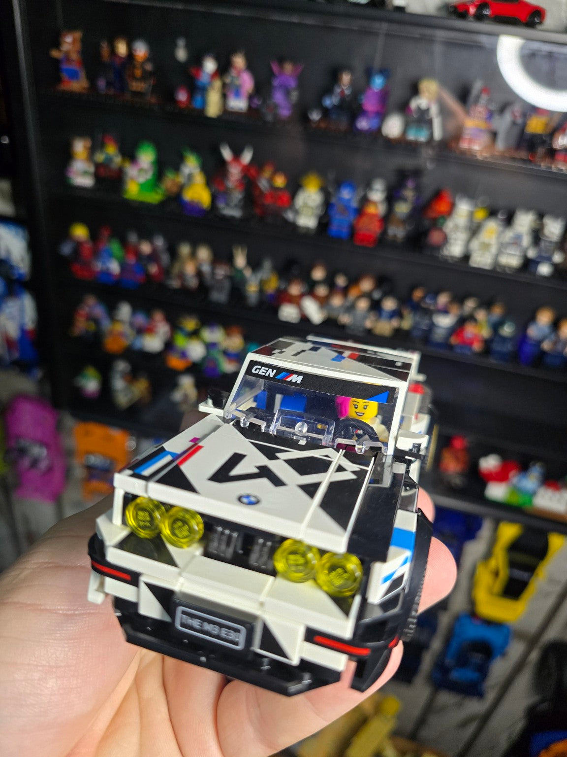 Built LEGO Speed Champions BMW M3 E30 front three-quarter view showing the driver figure
