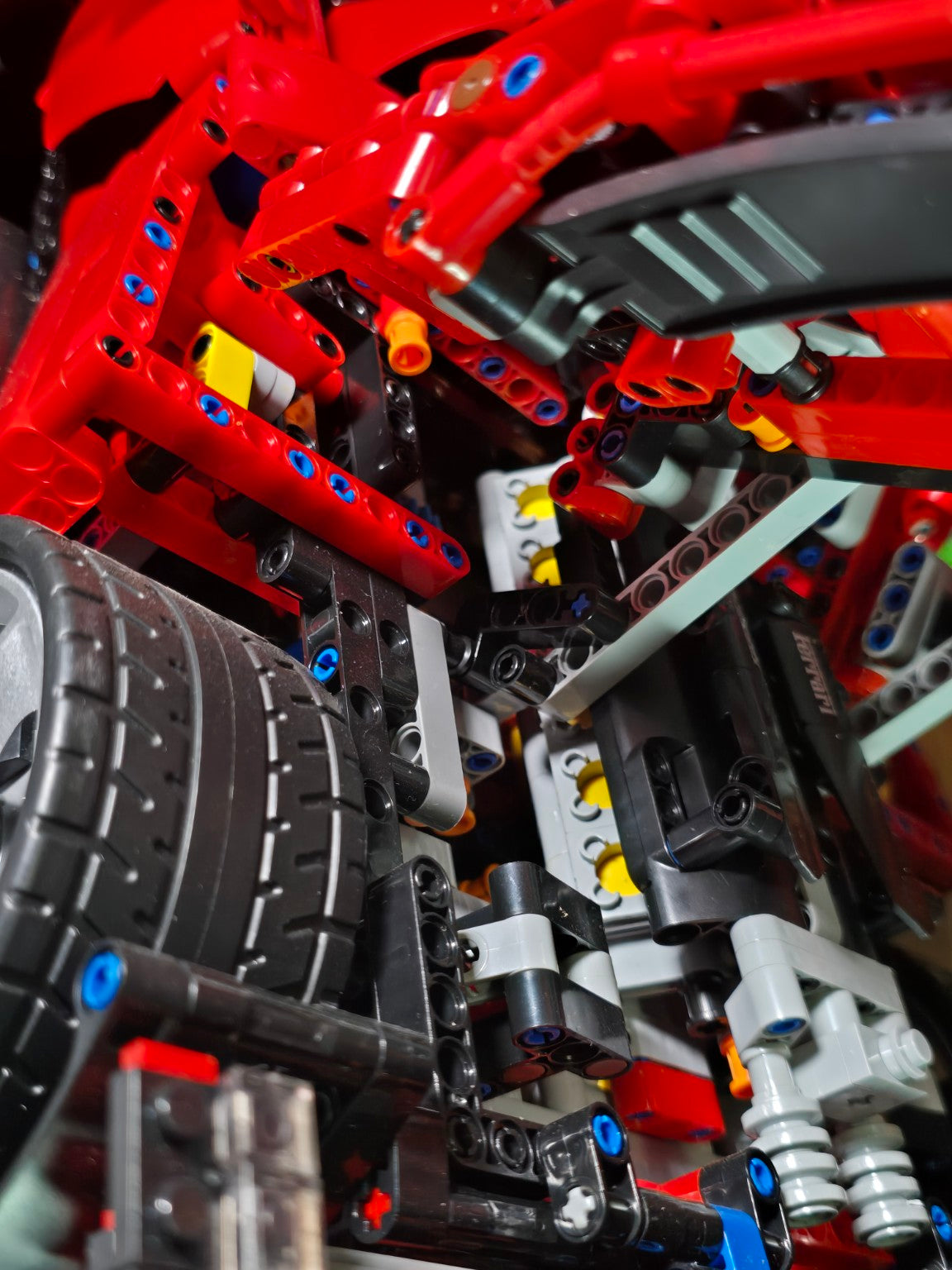Close-up of the internal Technic-style mechanical components in the BrickVivid Ferrari Daytona SP3 build