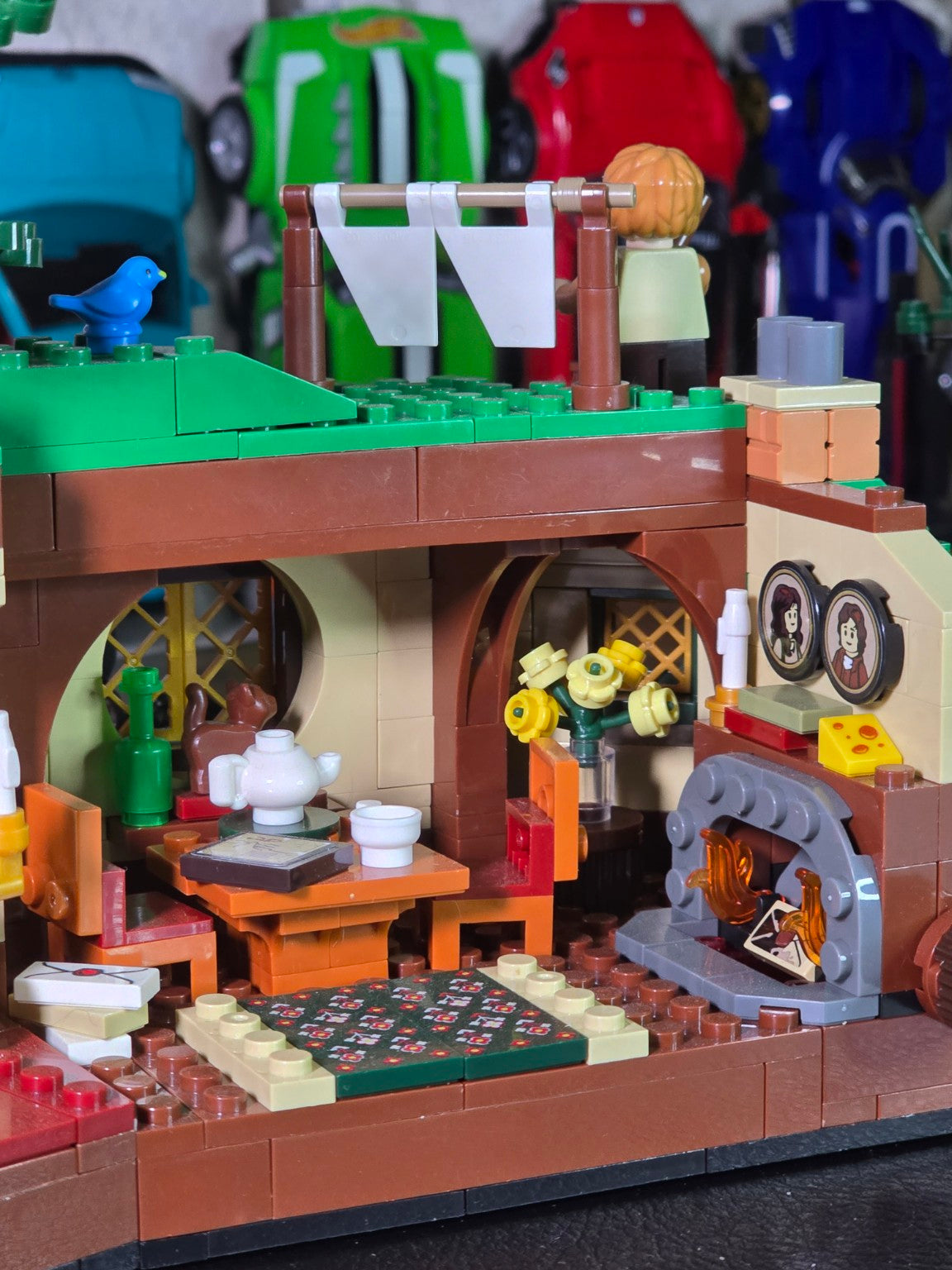 BrickVivid The Shire Bag End interior dining area and fireplace detail