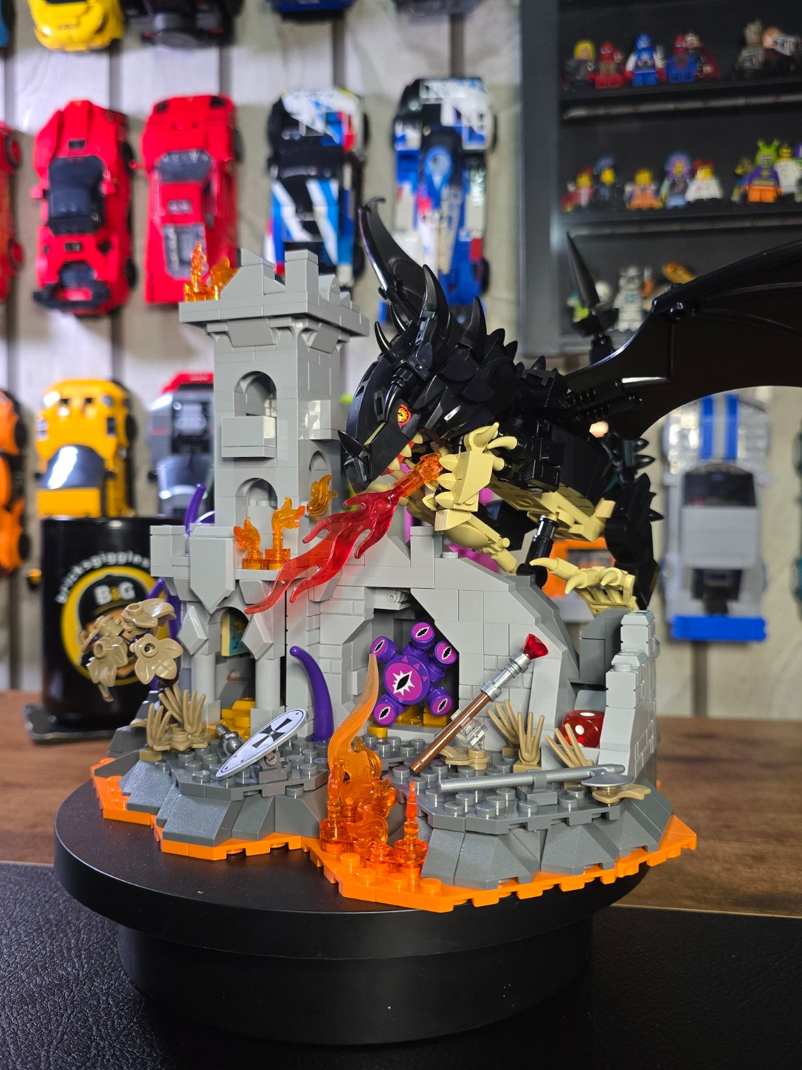 Finished IAMBRICK Dragonfire Castle build with removable black dragon displayed on the castle