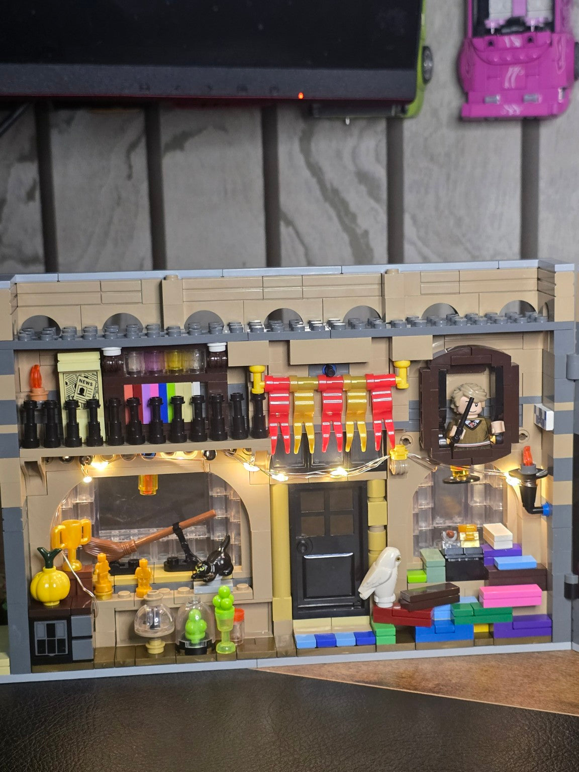 Workshop interior with tools, shelves and hanging lantern