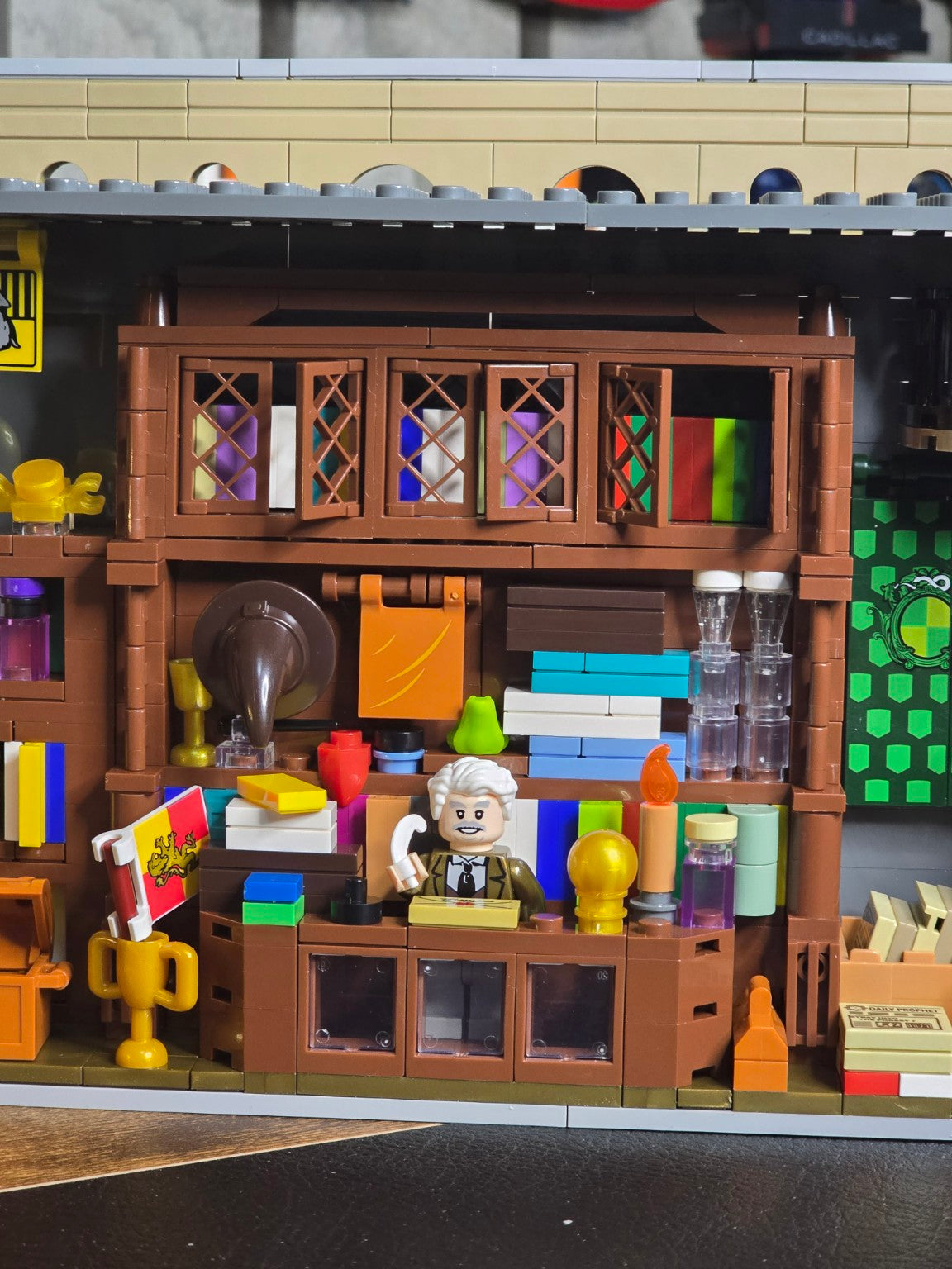 Colourful bookshop and upper library inside the Tokmoc Diagon Alley build