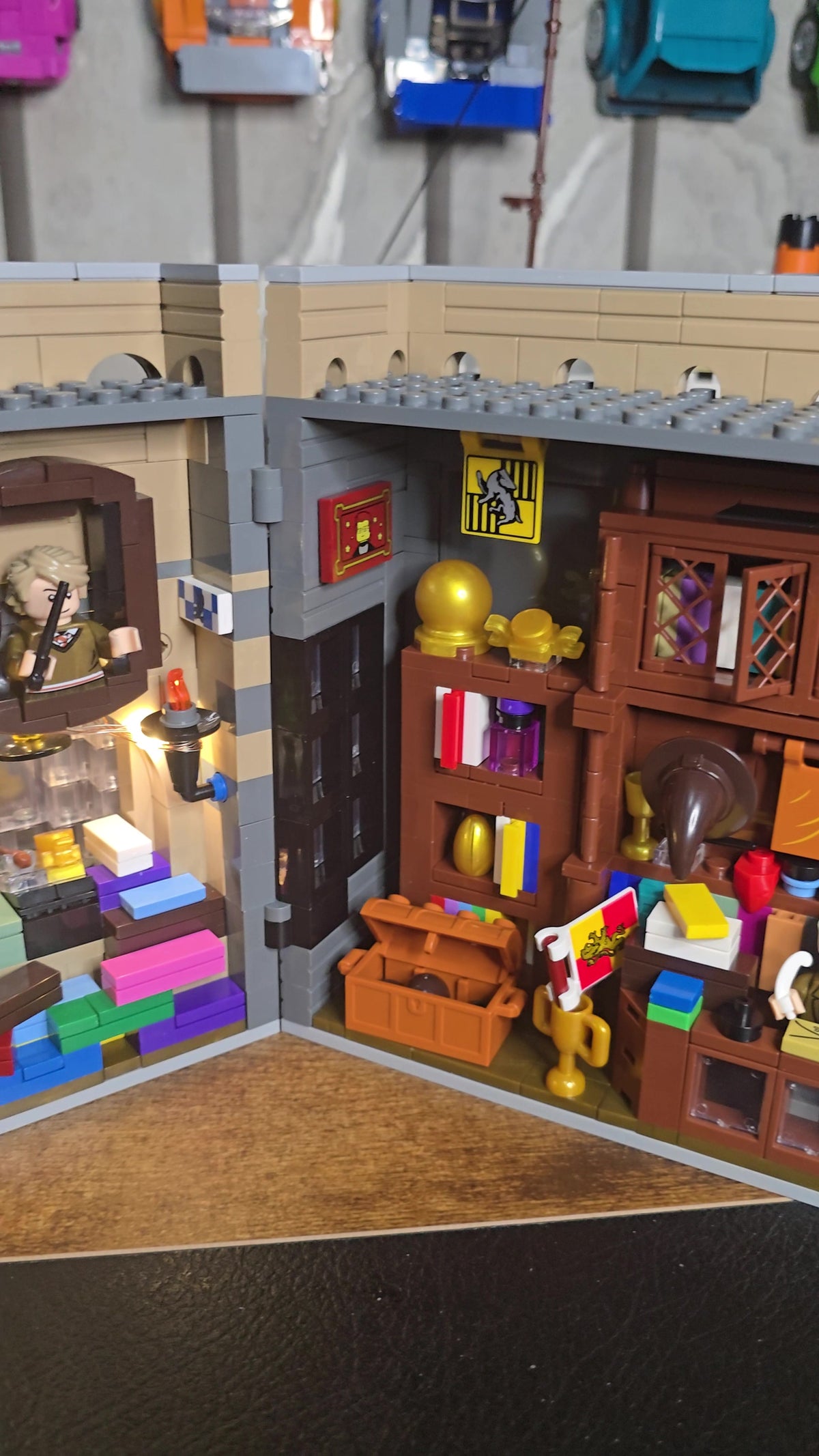 Lower shop interior with stacked books and colourful displays