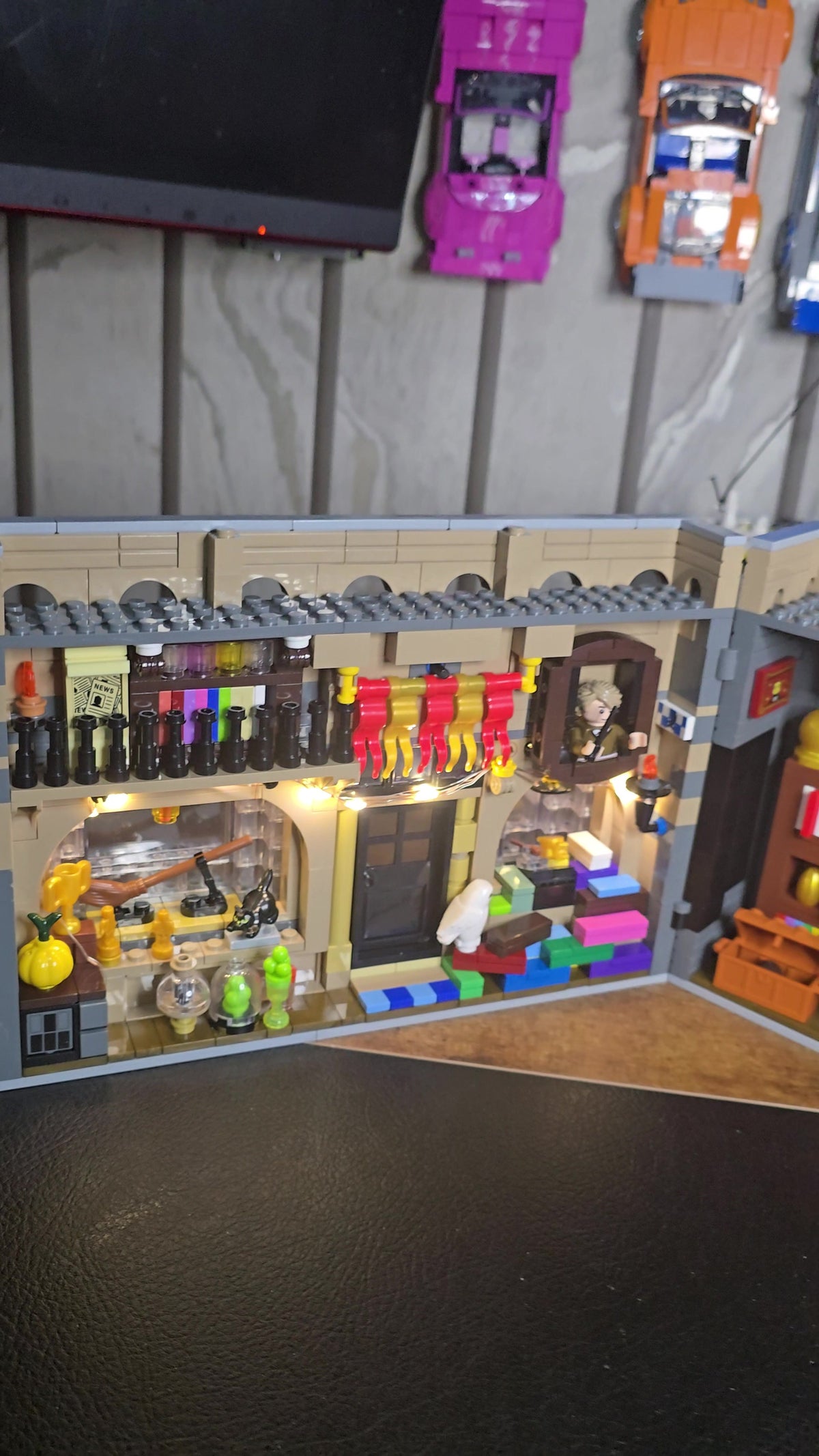 Shop interior with shelves, doorway and wall-mounted accessories