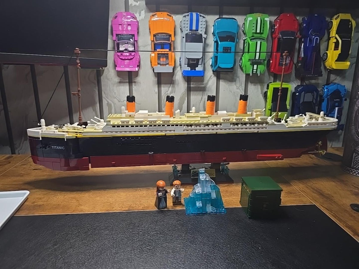 Finished Tokmoc Titanic displayed on a table with iceberg and figures